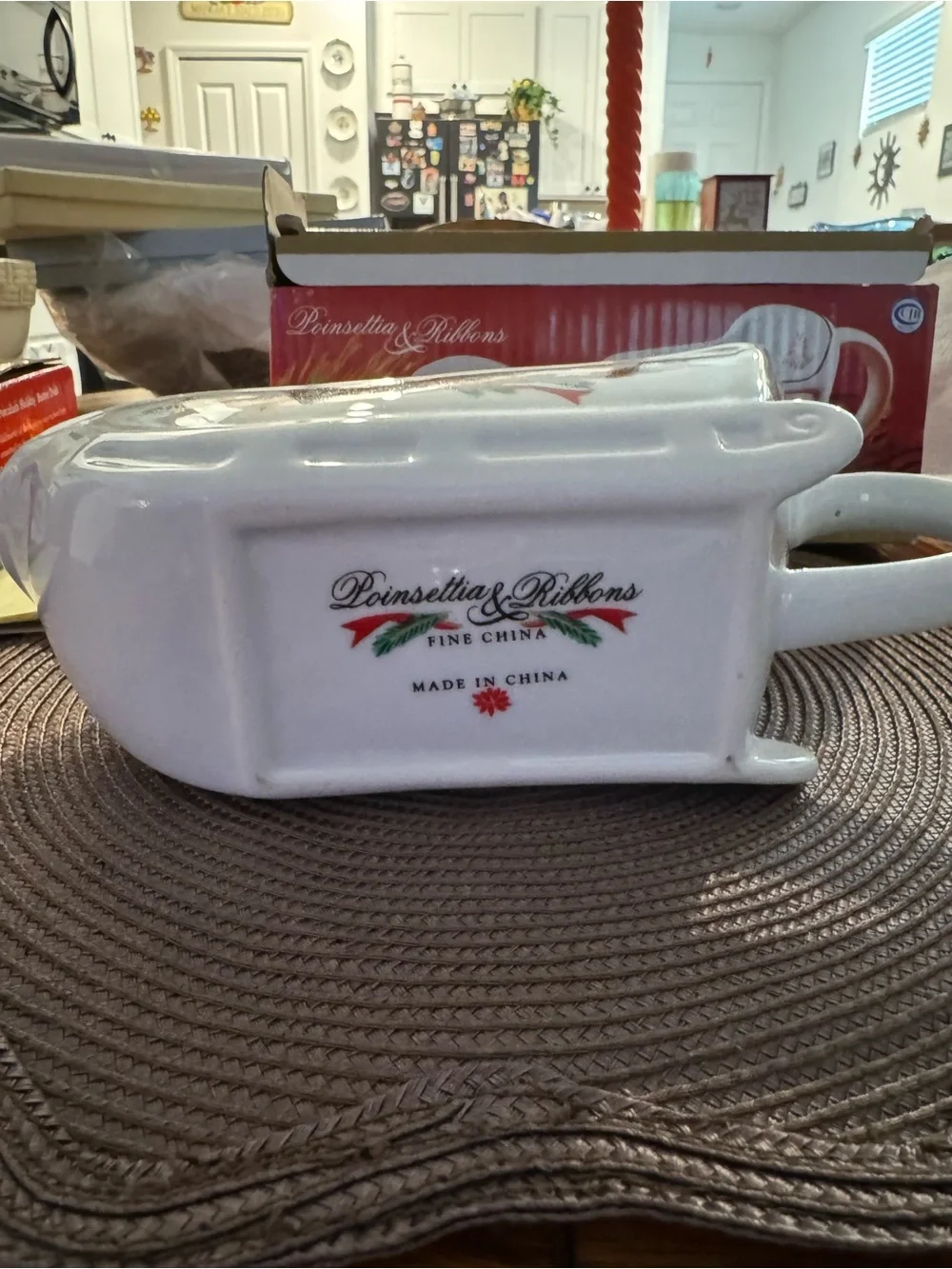 Classic White Ceramic Holiday Sleigh with Red & Green Ribbon Accents